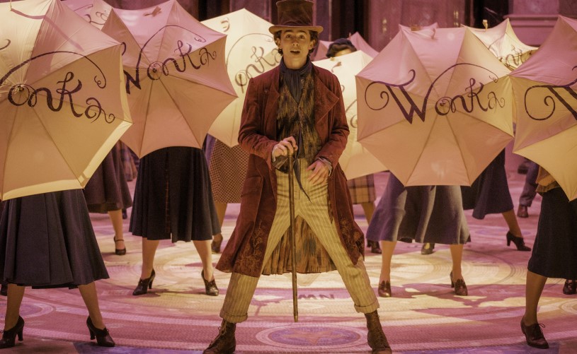 Willy Wonka stood with umbrellas